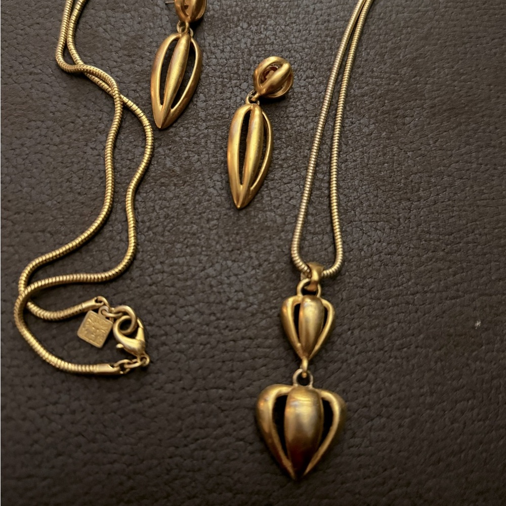 Vintage Ann Klein 30” necklace and matching earings.